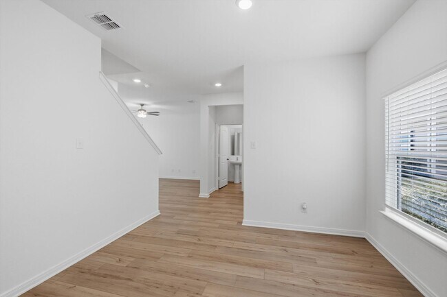 Building Photo - Clean & Modern Townhome with No Carpet and Lawn Service Included