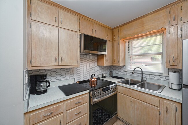 New kitchen awaiting new tenants - 1709 Roger Ave