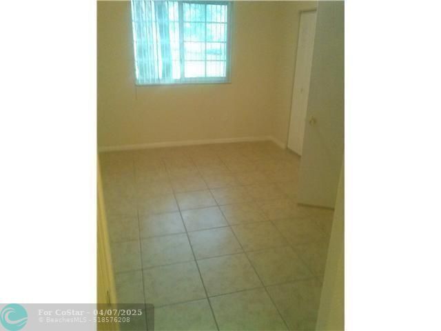 Building Photo - 3241 Sabal Palm Manor