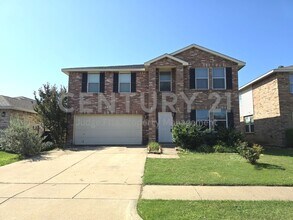 Building Photo - Spacious 2-Story 3/2/2 Home with Versatile...