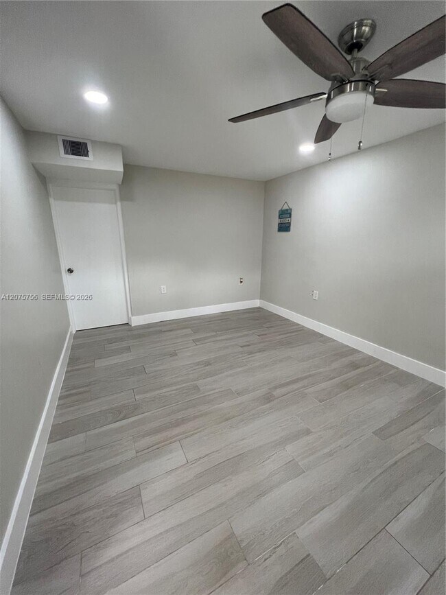Building Photo - 15012 Royal Palm Ave