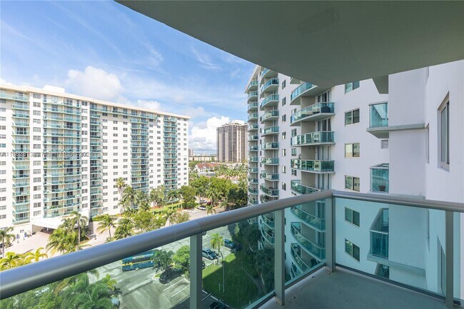 Building Photo - 19380 Collins Ave