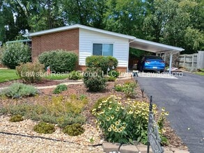 Building Photo - Charming Brick Ranch with Beautifully Land...