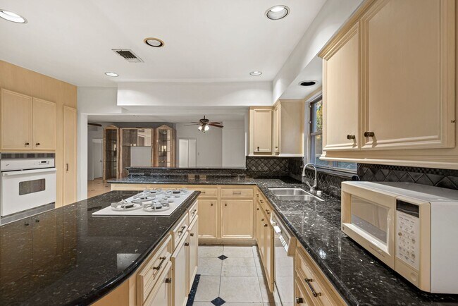 Building Photo - Charming Home with Expansive Backyard on a...