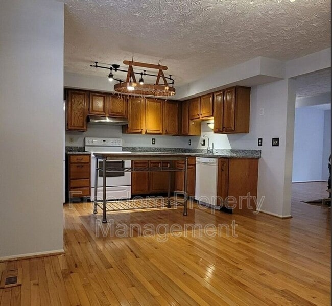 Building Photo - 7974 Tyson Oaks Cir