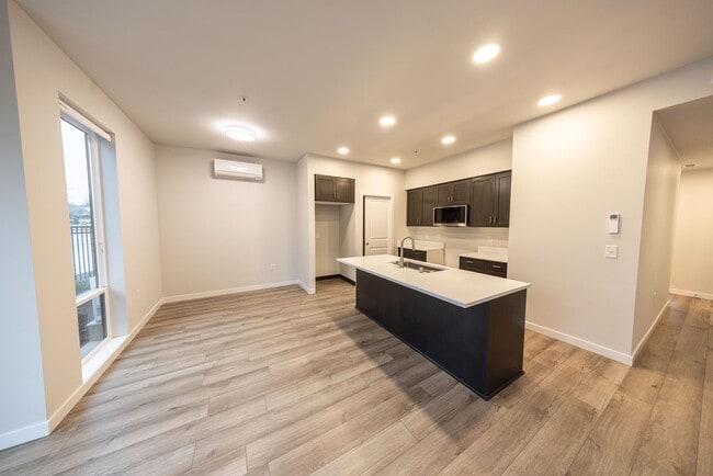 Building Photo - BRAND NEW - Reserve Street Lofts - Ground floor unit / ADA features