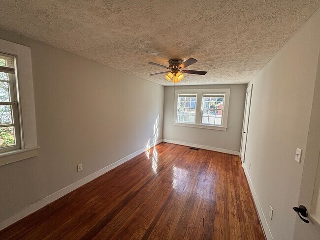 Building Photo - Where Style Meets Serenity — A Spacious, Charming Home in an Unbeatable Central Location