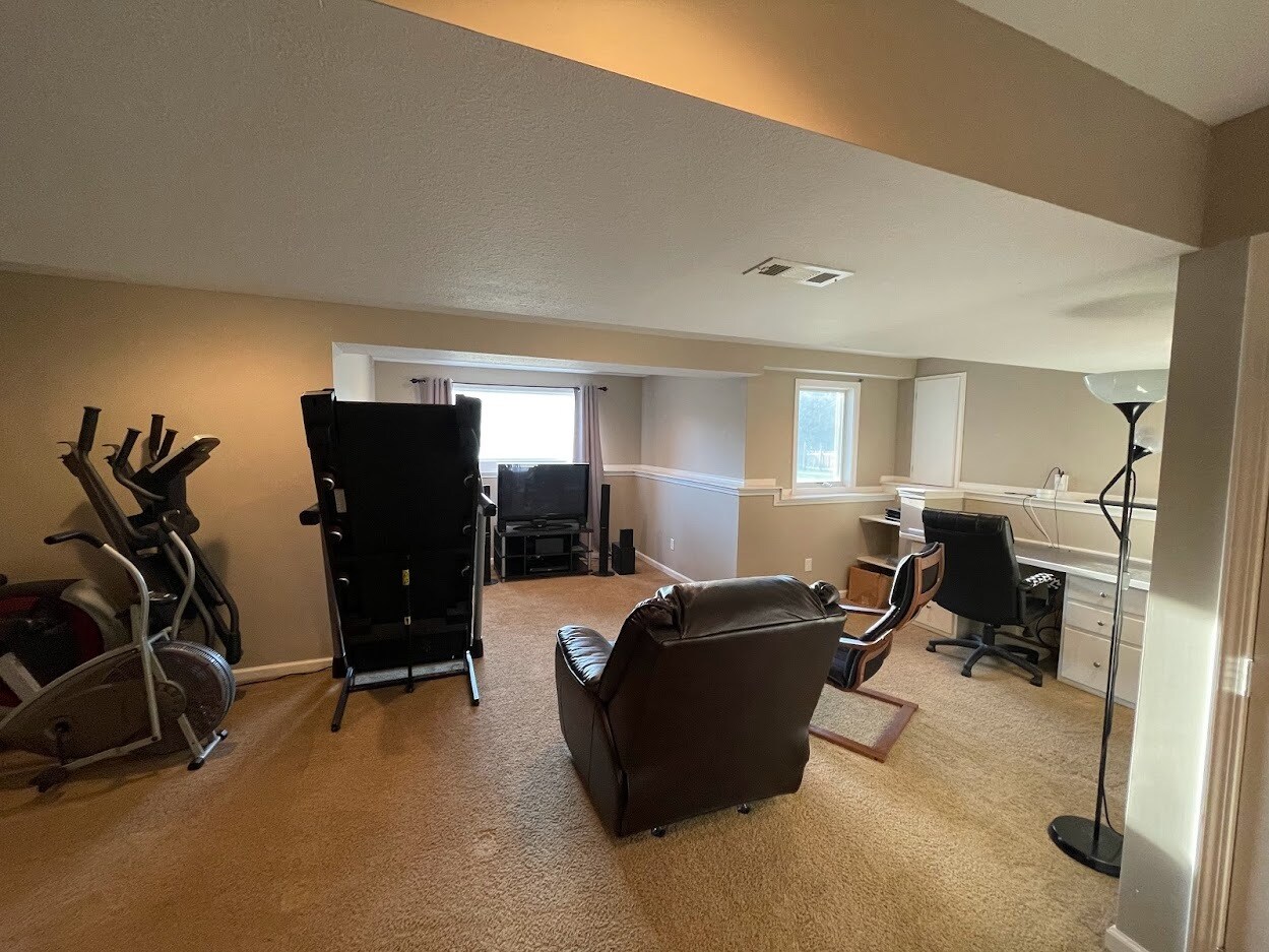 Basement Showing the Media Area, Built-In Office Desk - 13846 W 154th Ter