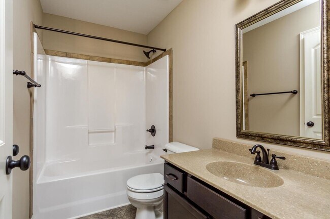 Building Photo - Pet Friendly Three Bedroom with Bonus!