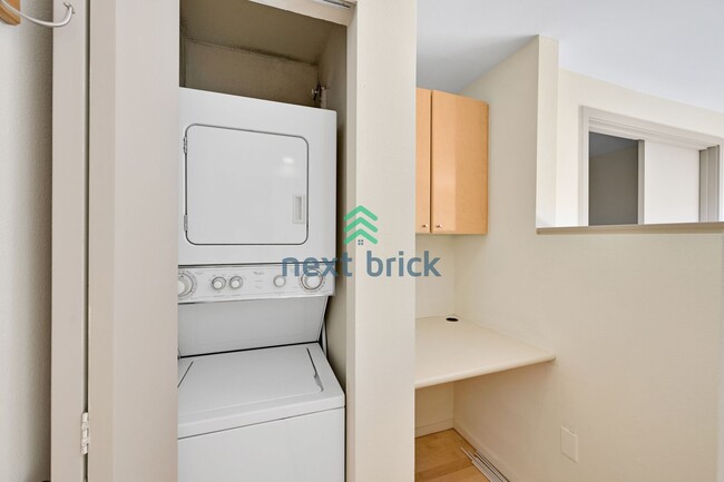 Building Photo - Modern Studio with Sleeping Alcove & Incre...
