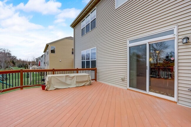 Building Photo - Grand 5 bed 4.5 bath Maple Grove Home w/ 3-Car Garage! Fully Furnished