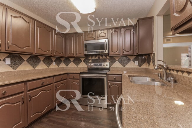 Building Photo - Turn the key. Enter. Smile. Repeat every day!