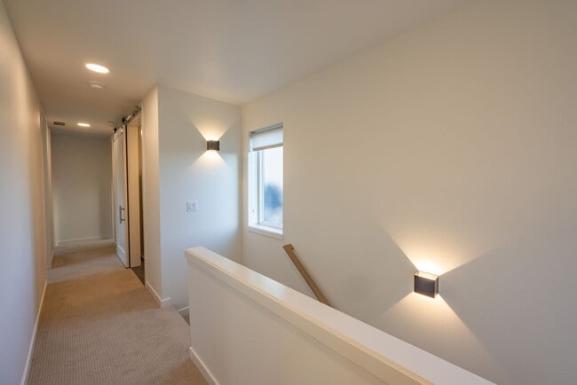 Building Photo - Riverside Townhomes - Waterfront Living in...
