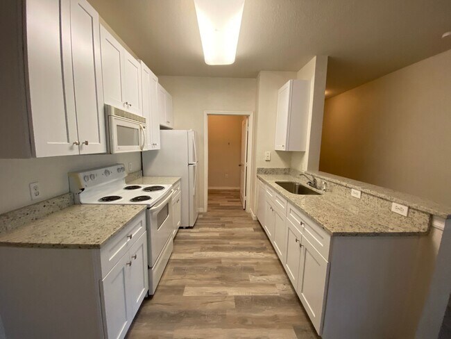 Building Photo - Ground Floor - 2 Bedrooms, 2 Bathrooms
