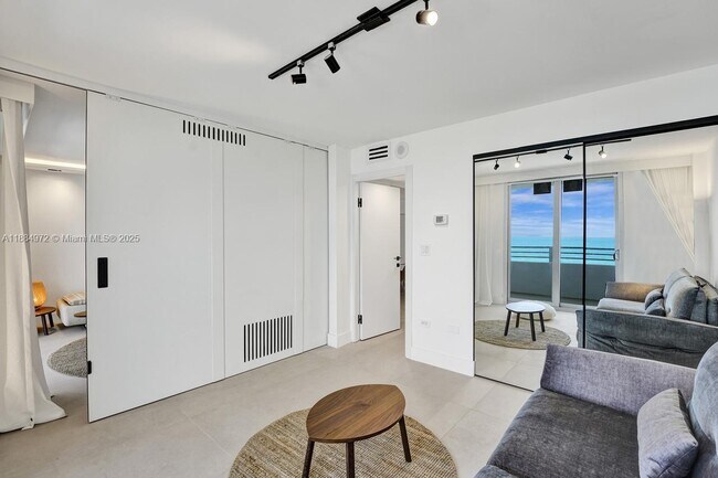 Building Photo - 5555 Collins Ave