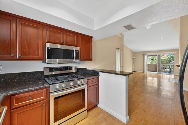 Building Photo - Gated Lake Forest Condo | Pool, Spa, Washer/Dryer & 3 Parking Spaces