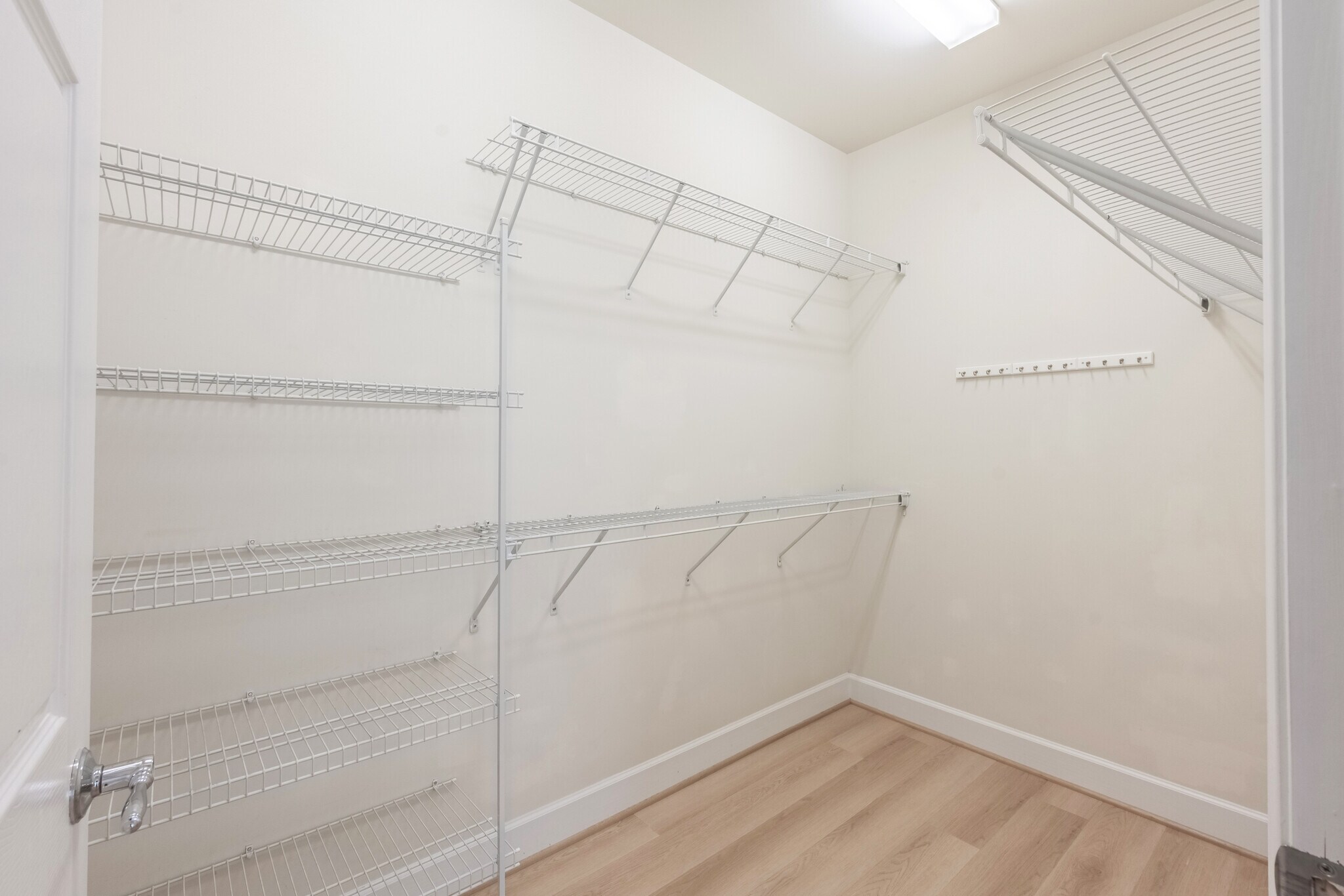 PRIMARY BEDROOM WALK-IN CLOSET - 8934 Yellow Daisy Pl