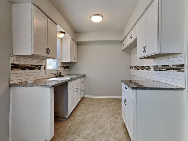 Building Photo - Newly Renovated Single Family Home | 4 BR/1.5BA | Garage Parking