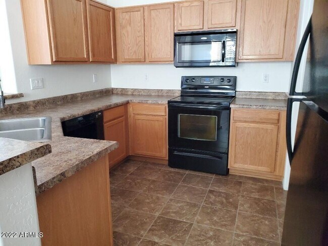 Building Photo - 1176 W Fruit Tree Ln