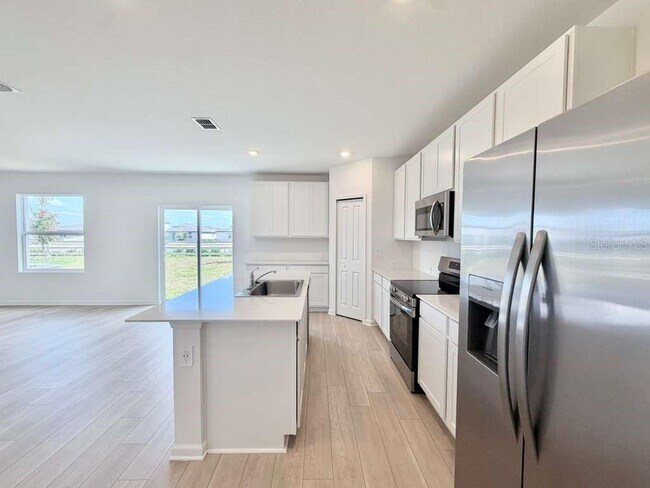 Building Photo - 6472 Domizio Dr