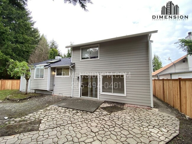 Building Photo - Stylishly Renovated Home with Private Back...