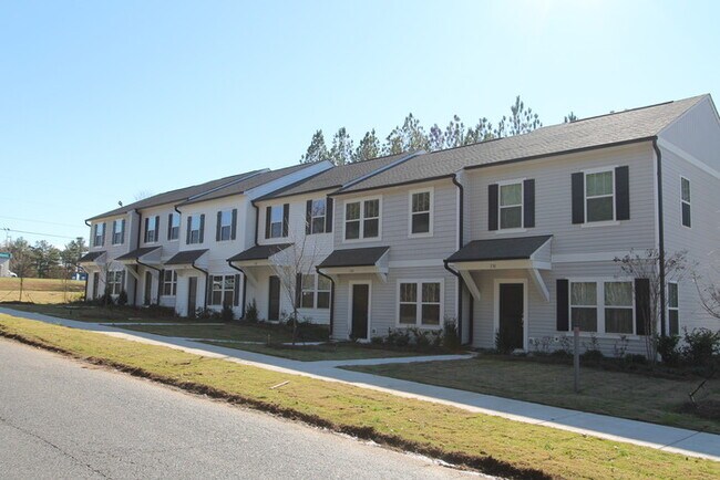 Building Photo - NEW 3 Bedroom Townhome Minutes from Downto...
