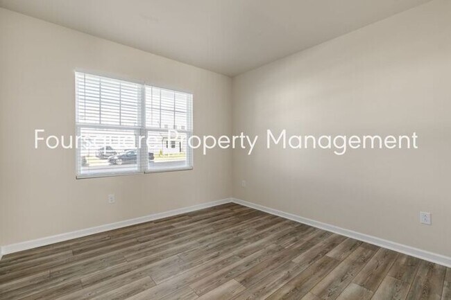 Building Photo - 4 Bedroom Home with 2nd Floor Loft- Kitchen Island & 2-Car Garage – Convenient Raleigh Location