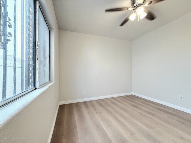 Building Photo - 1323 W 58th St