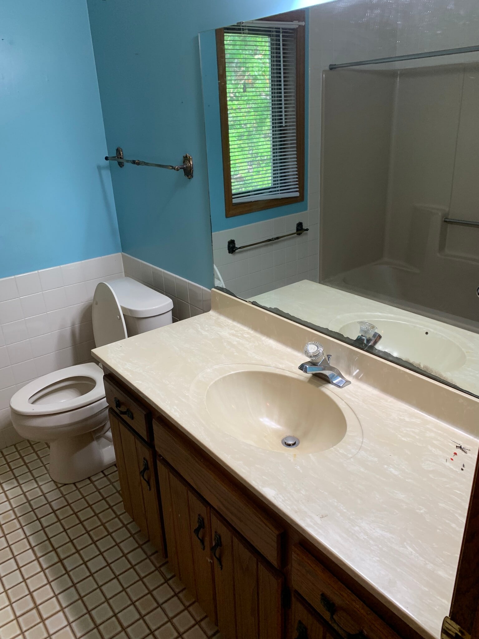 Main bathroom, view of tub in mirror - 719 N Gammon Rd