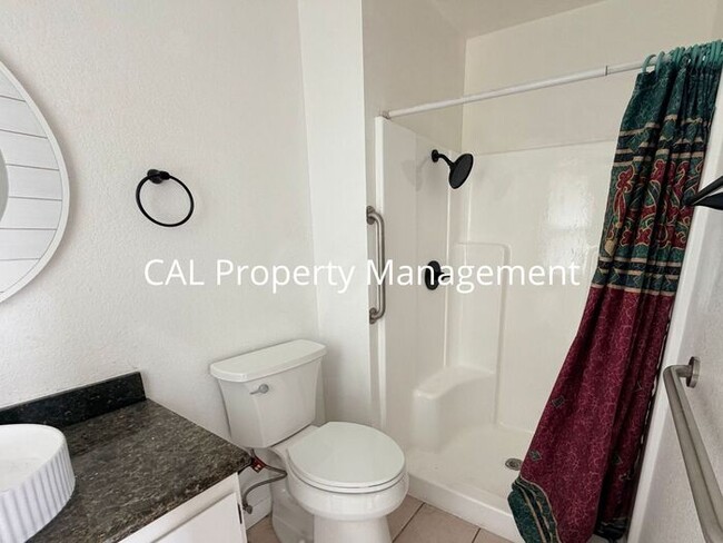 Building Photo - Spacious 4-Bedroom Home with 2-Car Garage & Backyard Oasis