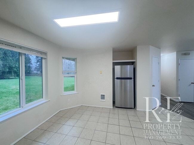 Building Photo - Duplex Living with Expansive Yard, LVP Flooring & Spacious Layout