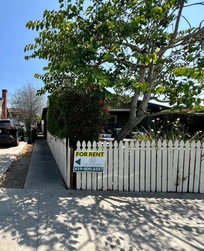 Building Photo - Pet Friendly Unit within Gated Community in North Park! COMPLIMENTARY Laundry! Street Parking Only!