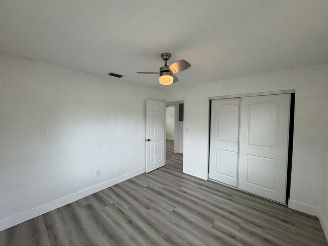 Building Photo - Recently Renovated 4/2 Home with Open Layout & Huge Backyard