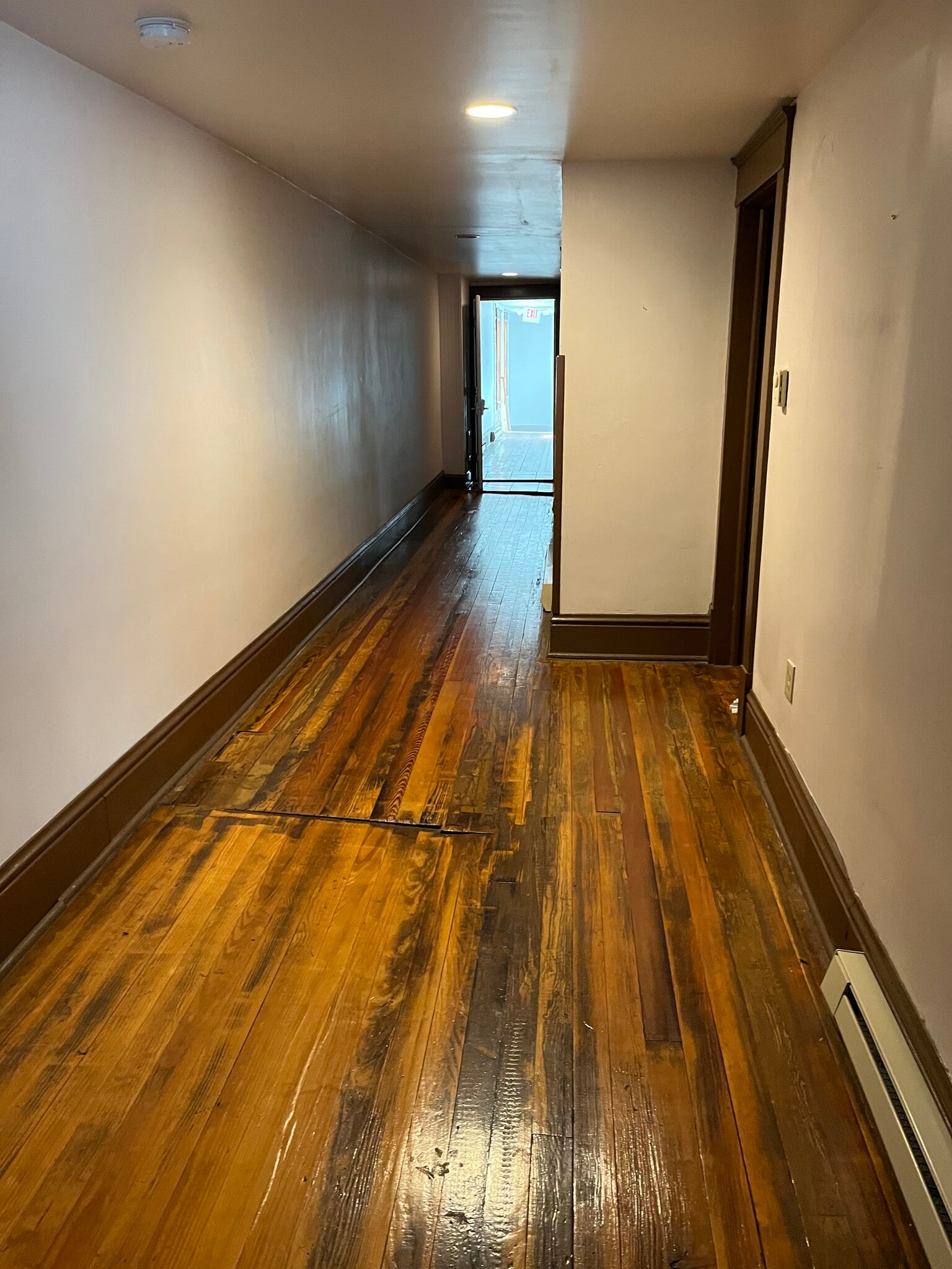 Interior hallway to exterior hallway - 117 N Front St