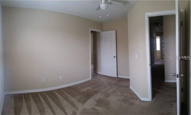 Building Photo - 10525 Cabbage Tree Loop