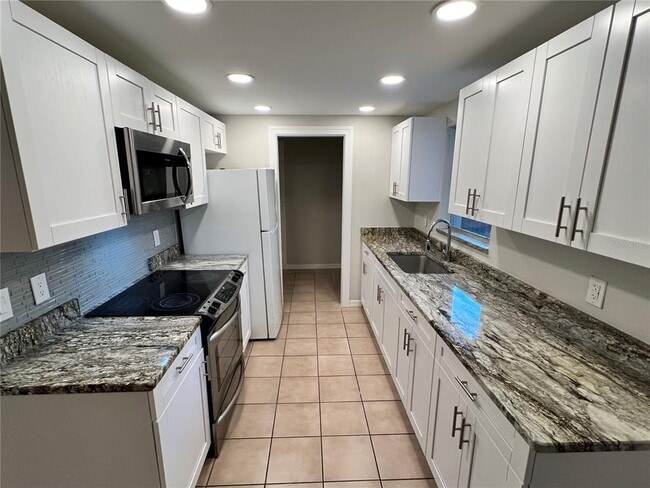 Building Photo - 8307 Needles Dr