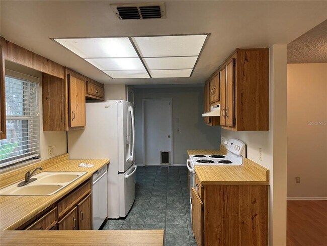 Building Photo - 4010 Woodsong Dr