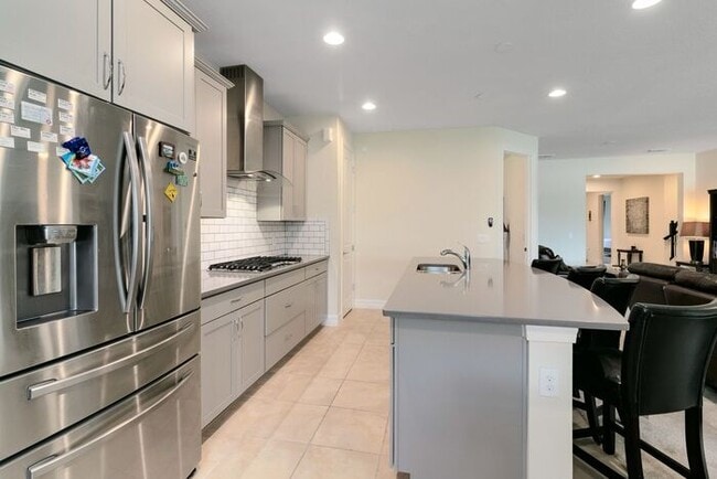 Building Photo - 4 Bedroom/3.5 Bathroom Gated Community at Ruby Lake!!!!