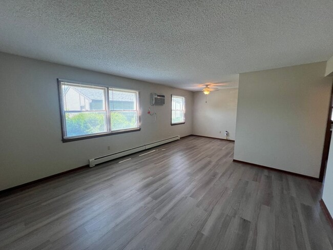 Building Photo - Fully Renovated 2-bed, 1-bath Apartment with a Garage Stall!