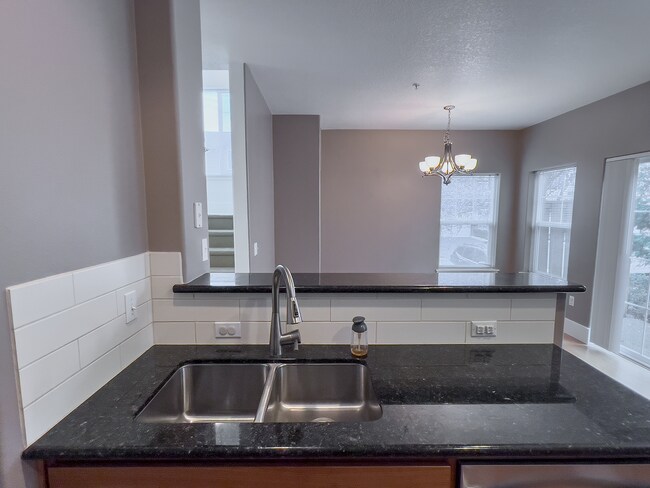 Building Photo - Enjoy this 3 Bedroom 2.5 Bathroom End Townhome ~ 2 Car Garage + Washer & Dryer! Great Cedar Mill ...