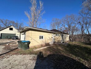 Building Photo - 2 Bedroom house with 1 car attached garage $795per month