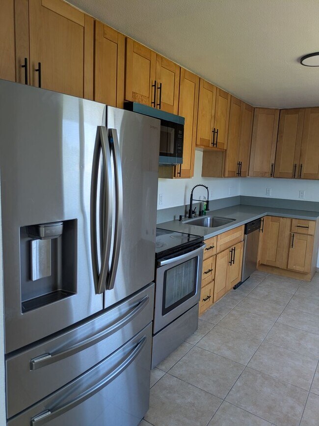 Building Photo - **Spacious 4-Bedroom, 2-Bath Residence with Waterfront & Hillside Views – Vallejo**