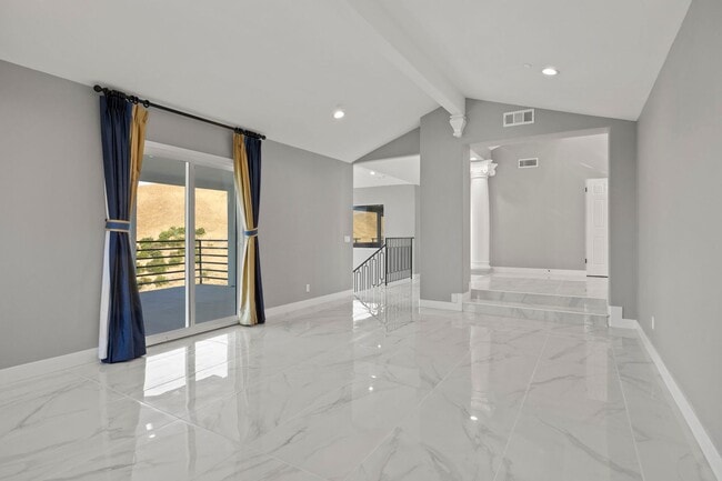 Building Photo - Modern Elegance Meets Scenic Privacy in Be...