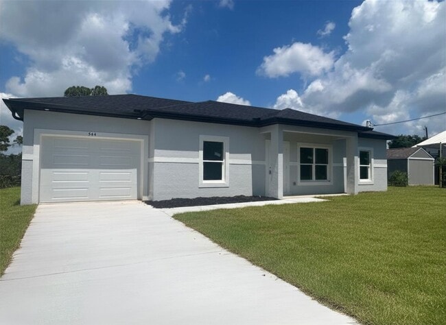 Building Photo - NEW CONSTRUCTION! Modern 3BR/2BA Home with Garage-Peaceful Lake Placid Location