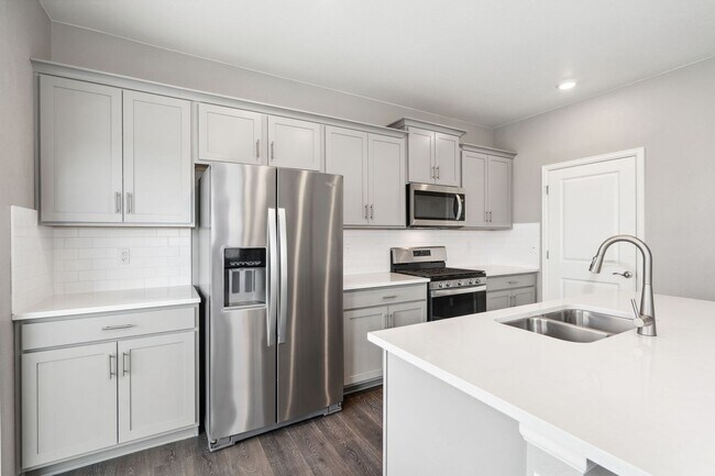 Building Photo - LOOK AND LEASE: MAY RENT FREE Spacious 4BD...