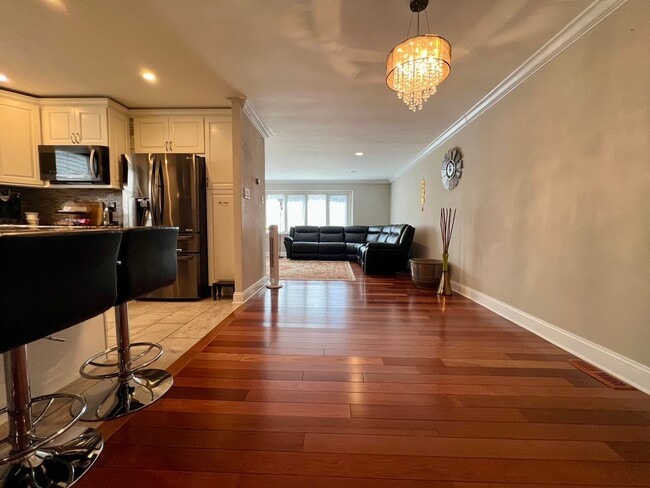 Building Photo - Gorgeous 4-Bedroom Townhome with One-Car Garage! Available NOW!