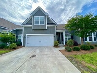 Building Photo - Spacious Three Bedroom Town Home! Located ...