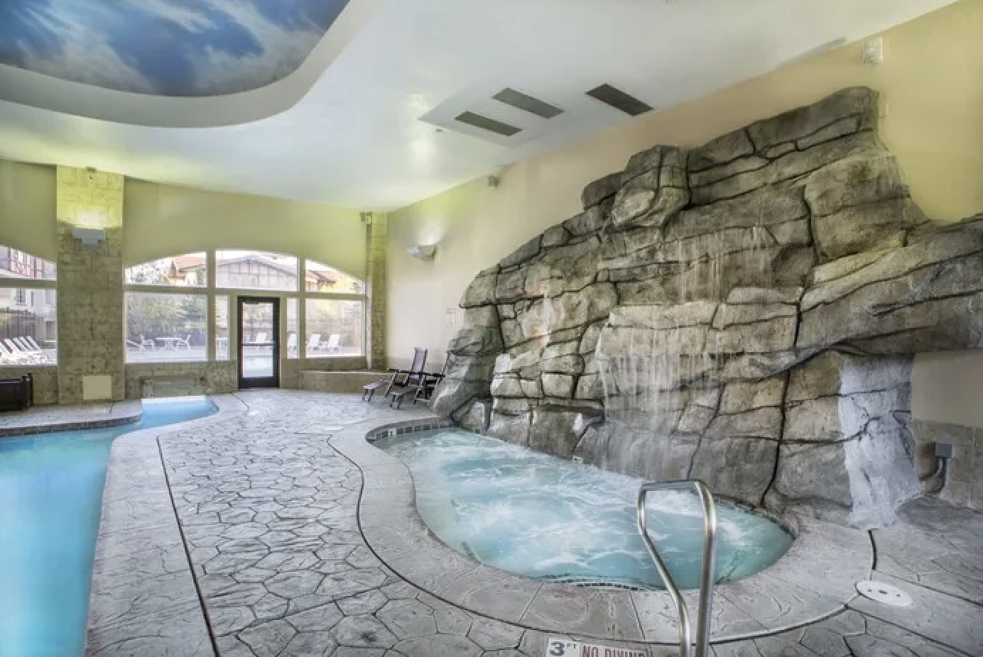 Indoor hot tub features a waterfall - 840 Bigler Ln