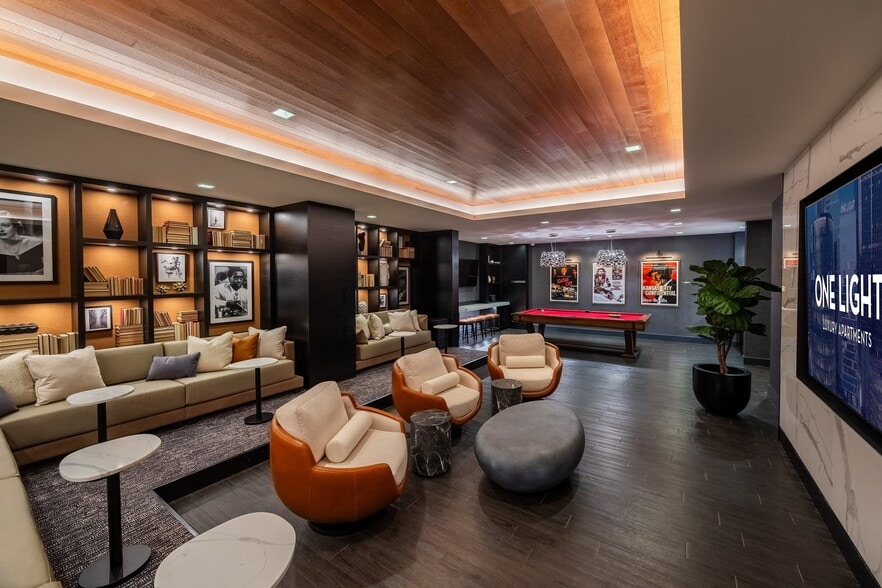 The refreshed theater and social room at One Light Luxury Apartments - One Light Luxury Apartments
