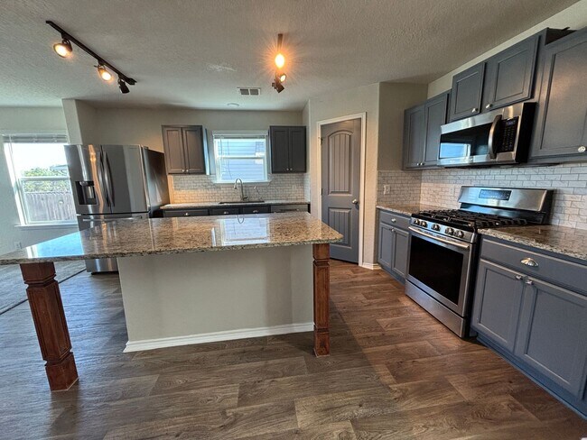 Building Photo - 14721 Hooded Merganser